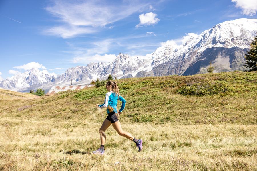 Runner crossing the high meadow