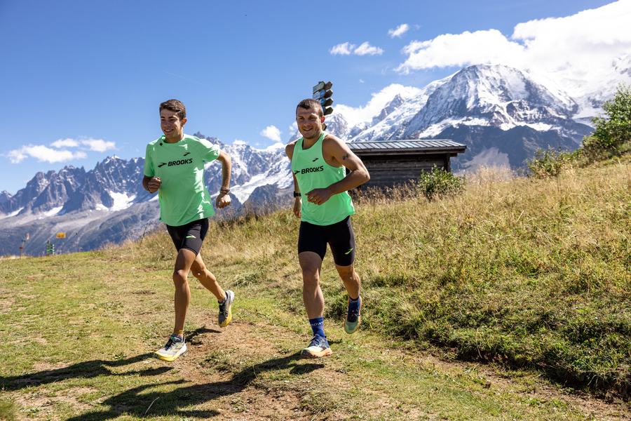 Two athletes running the ridge trail
