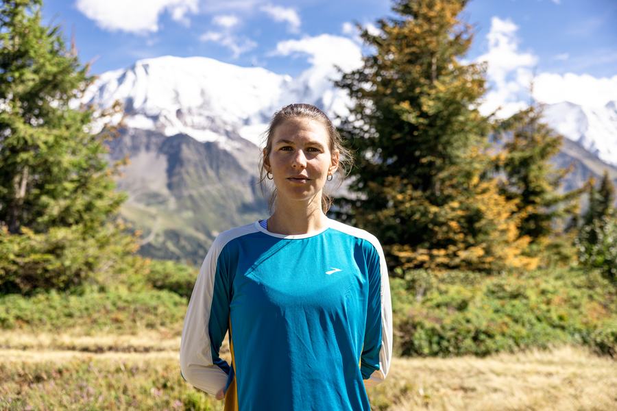 Athlete portrait against the peaks