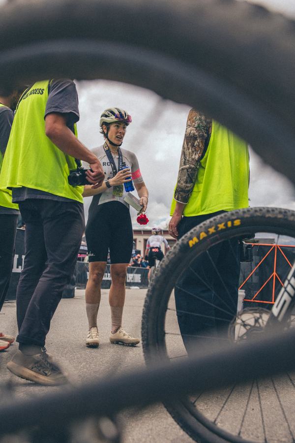 Bikes and volunteers at the finish