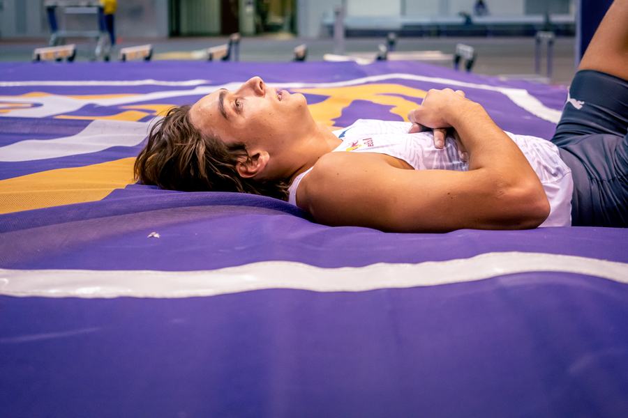 Lying on the landing mat between attempts