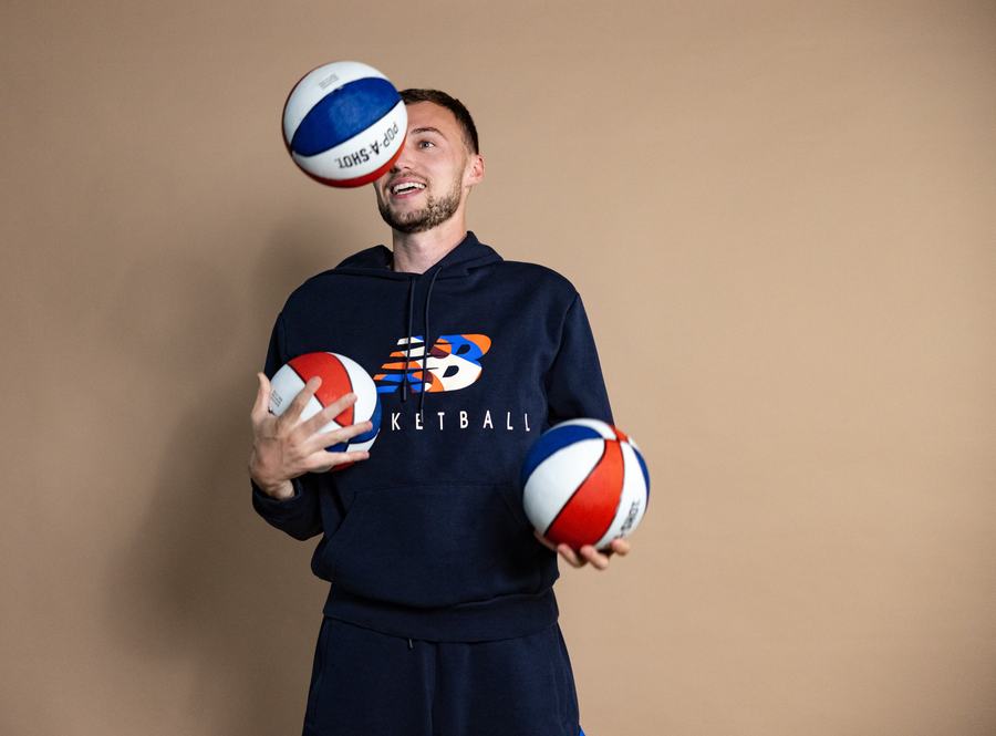 Basketballs, mid-juggle