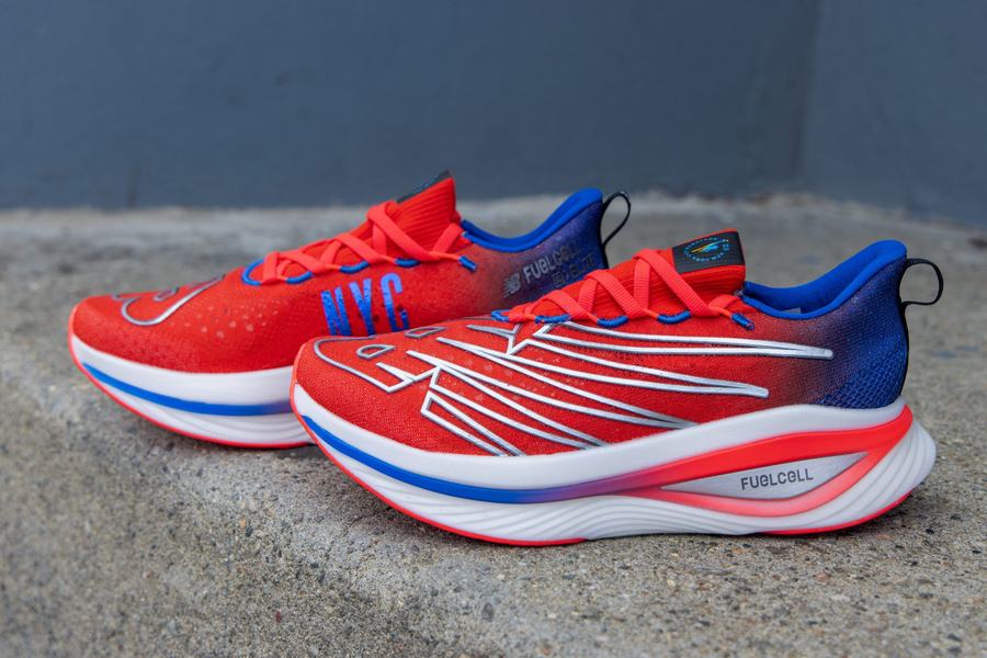 New Balance NYC Marathon race shoe, pair on pavement