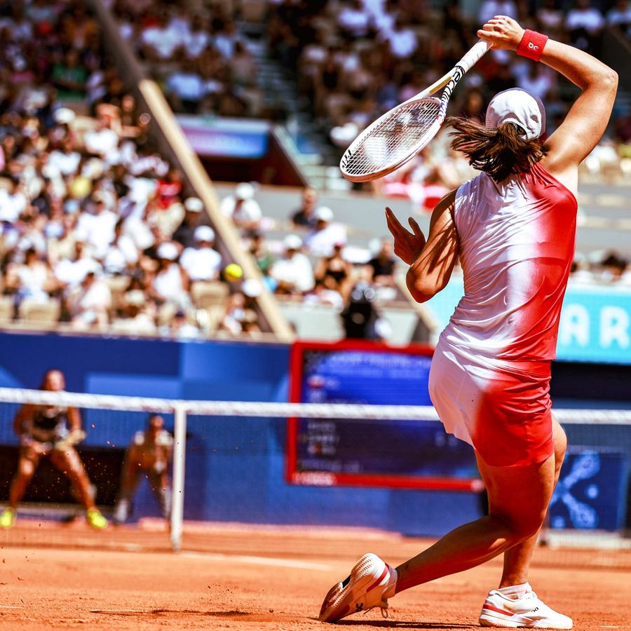 Serving in the Paris sun