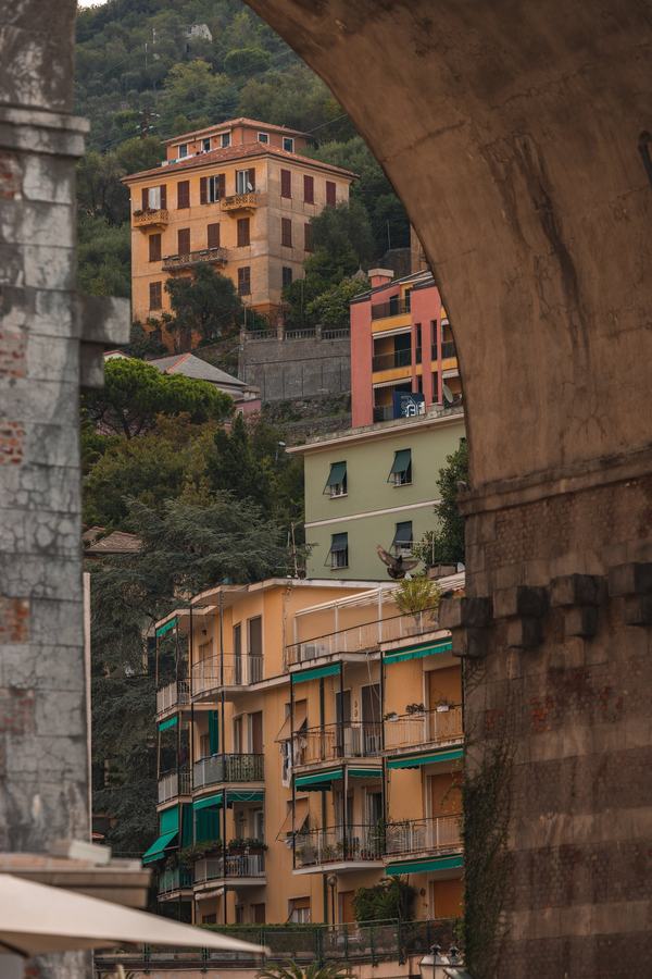 Under the arch, village behind