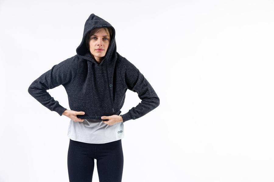 Hooded, hands on hips