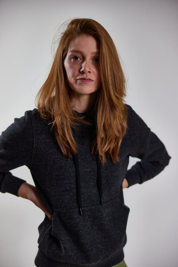Red hair, dark hoodie