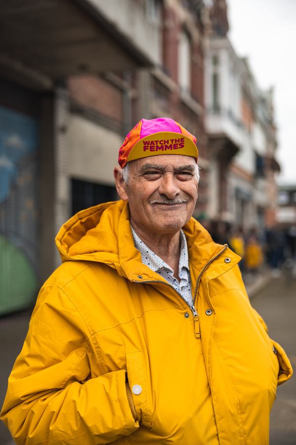 A fan in a yellow jacket