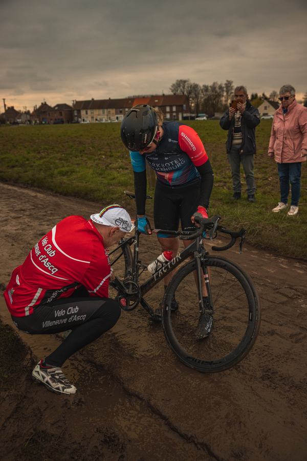 Fixing a bike at the roadside