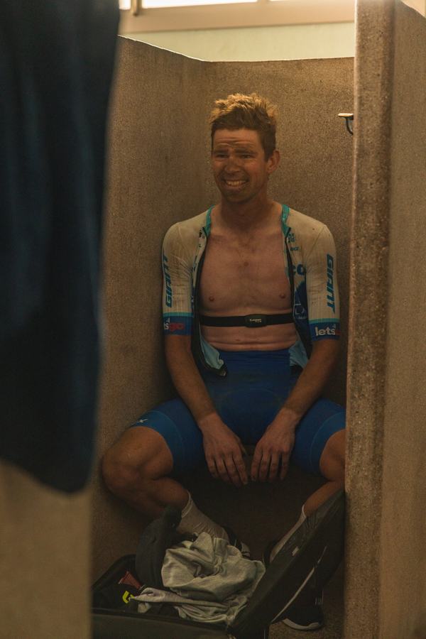 Seated in the cubicle