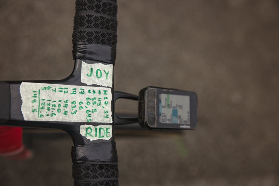 A note taped to the stem: joy, ride