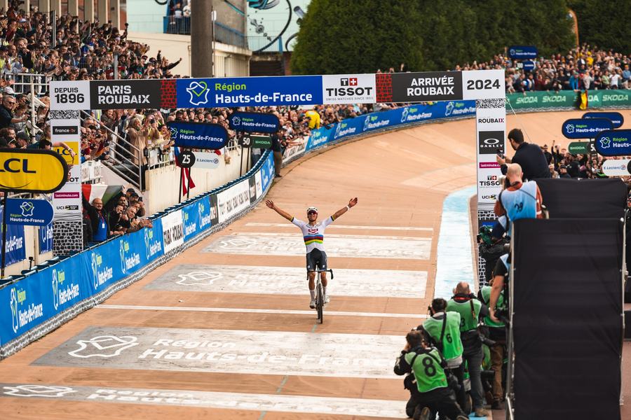 Van der Poel crossing the line alone in the Roubaix velodrome
