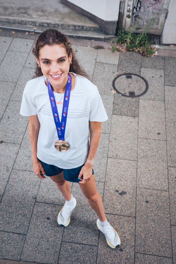 Looking up, medal on