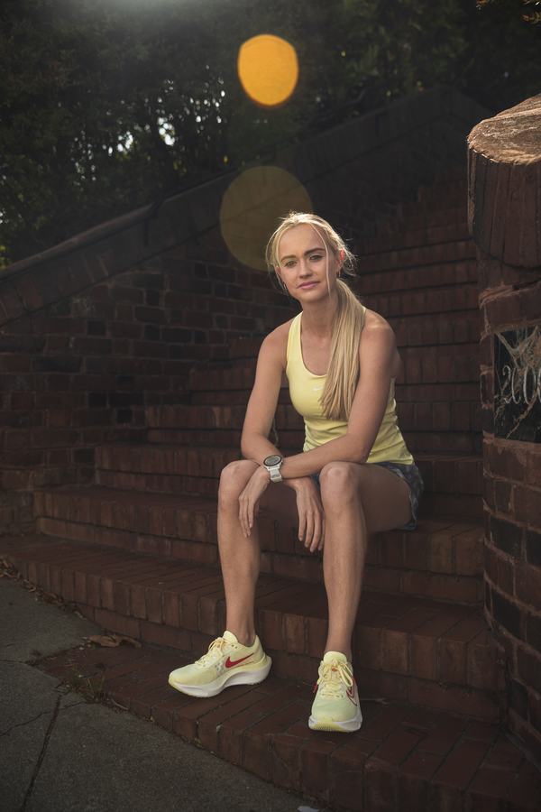 Seated on brick steps