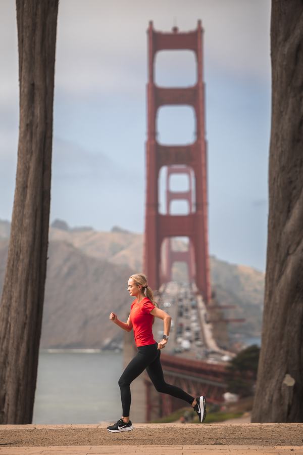 Running through the eucalyptus with the bridge beyond