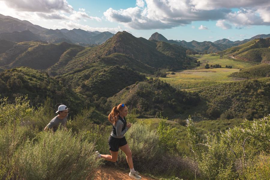 Runners small against the Santa Monica Mountains
