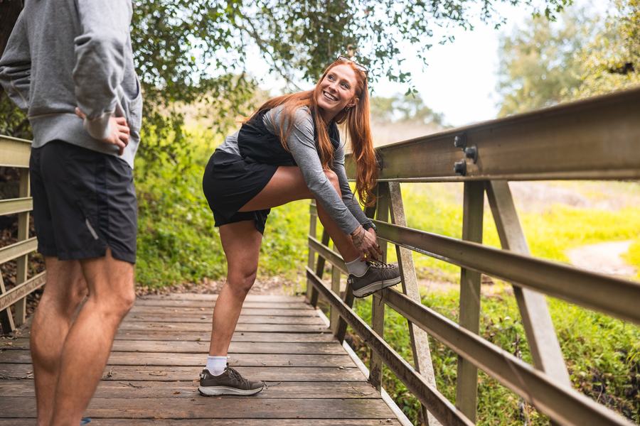 Stretching on a wooden bridge