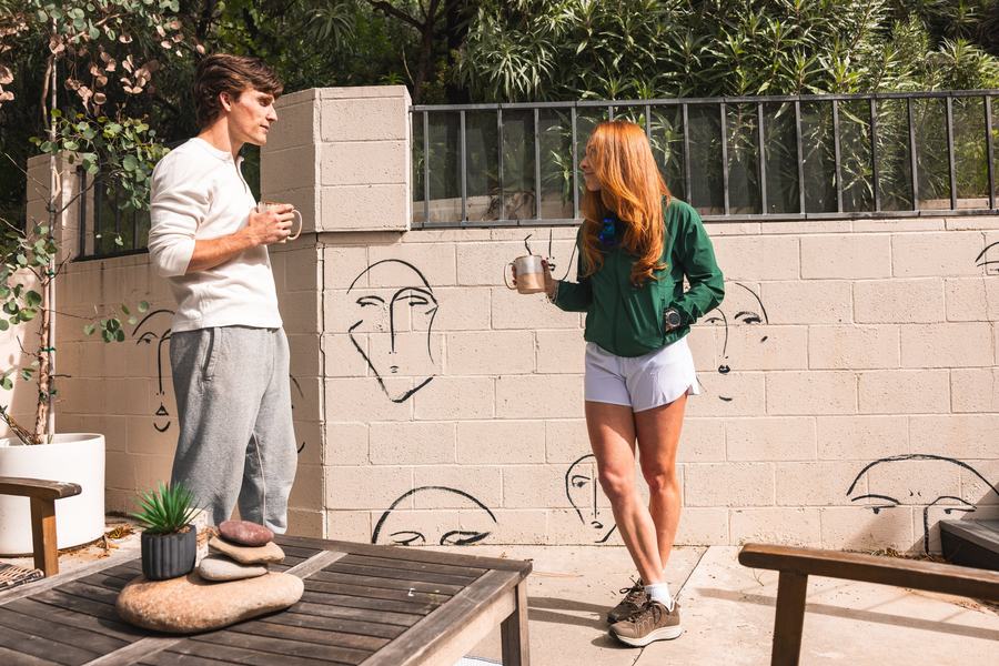 Coffee by the mural wall