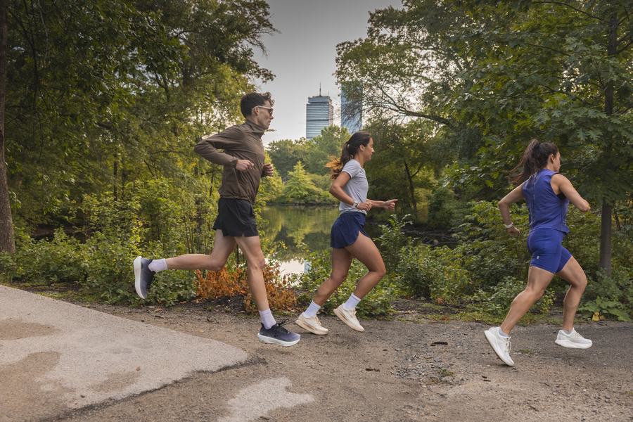 Runners on the trail by the river