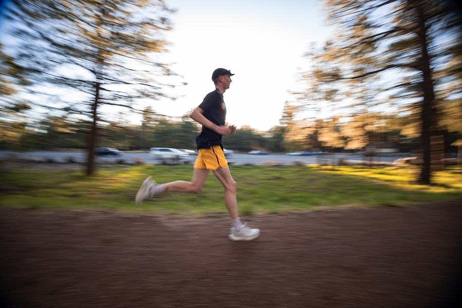 A runner at speed, panned