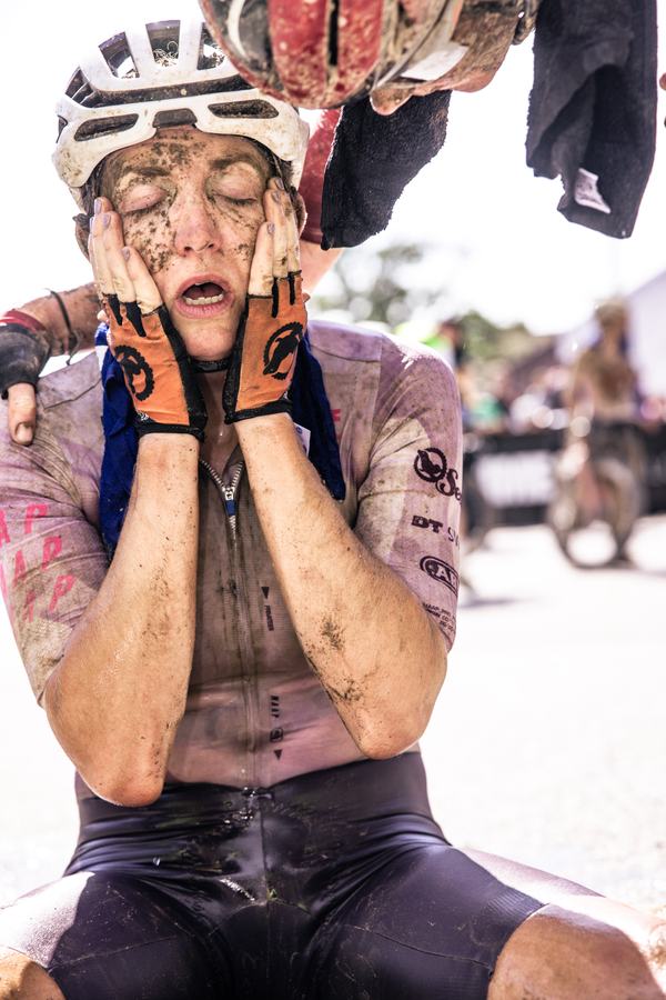 Exhausted finisher catching their breath