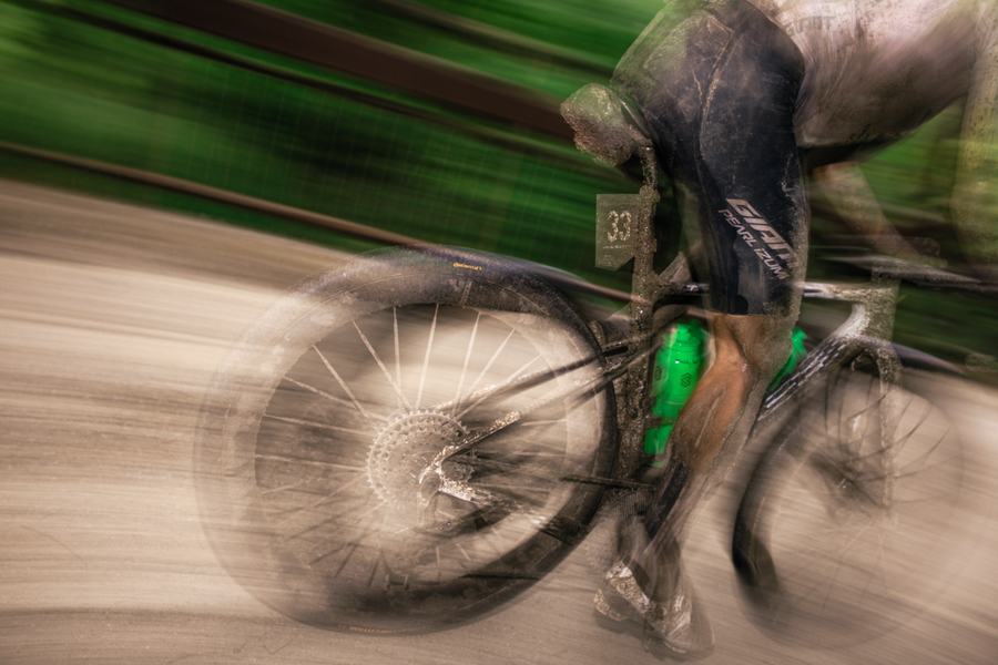 Panned blur of a rider on gravel