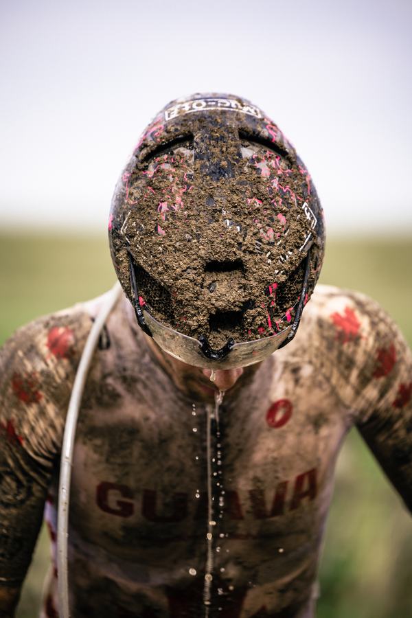 Rider covered head to toe in mud