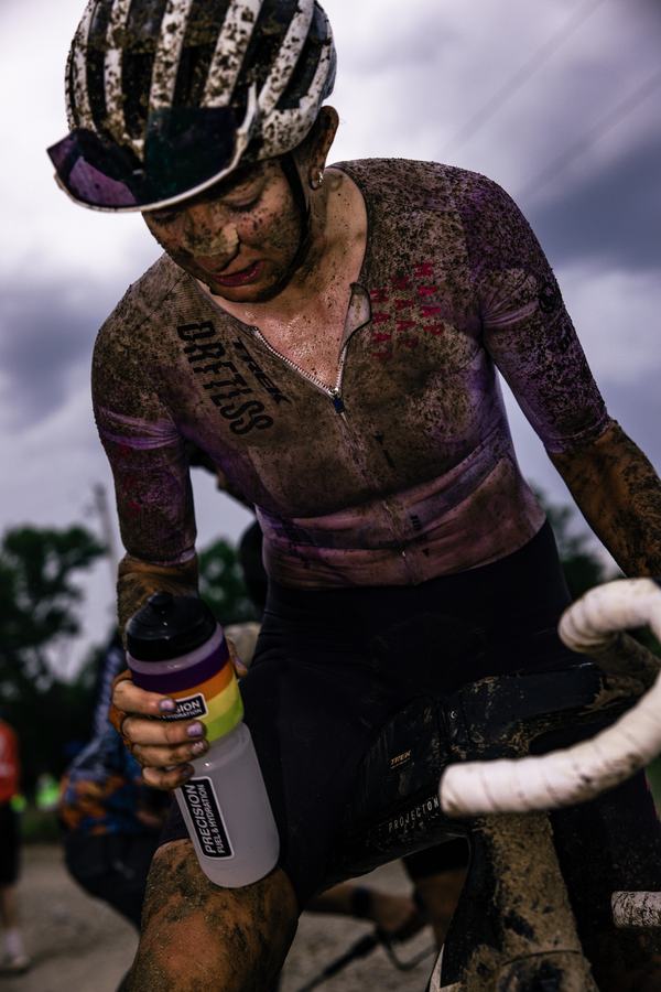 Drinking from a bottle mid-race